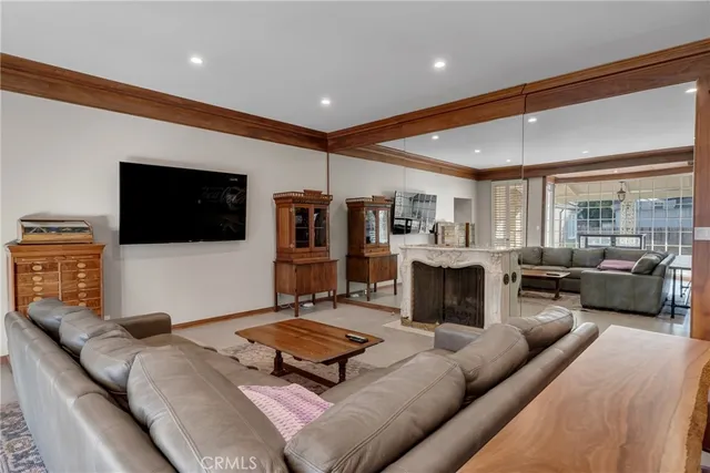 a kitchen with granite countertop a stove and a white cabinets