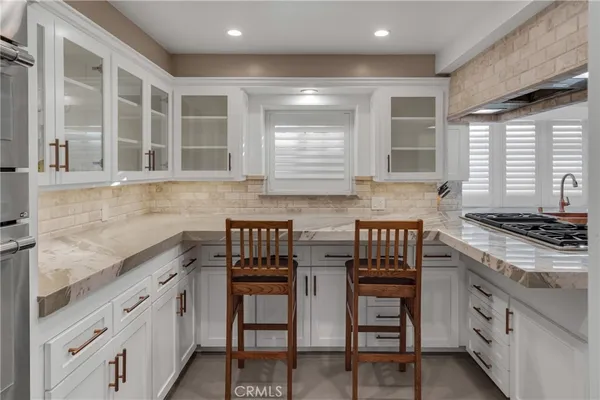 a bathroom with a sink and a shower
