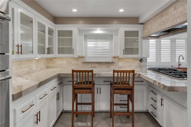 a bathroom with a sink and a shower
