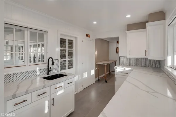 a bathroom with a tub and a shower