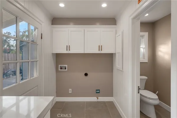a bathroom with a granite countertop sink mirror and double