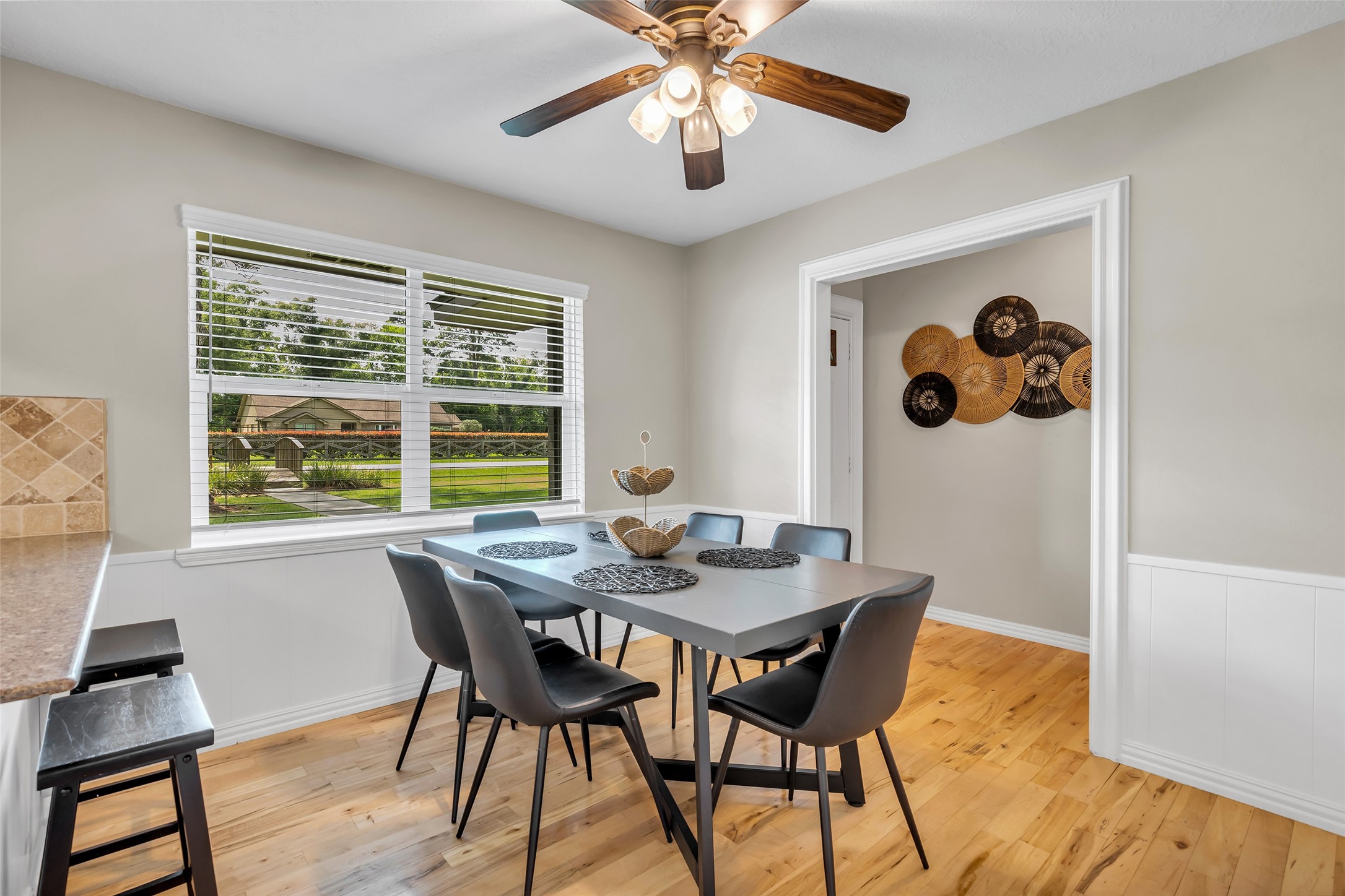 22502 Fields Lane Spring, TX 77389 - Photo 11 of 39 Bright dining area with a large window overlooking a green yard.