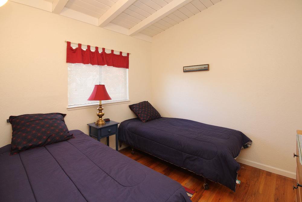 611 Middlefield Drive Aptos, CA 95003 - Photo 8 of 11 a living room with furniture and a window