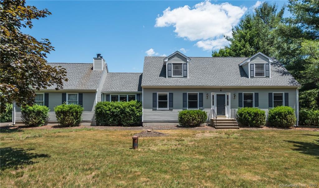 187 Walnut Tree Hill Road Newtown, CT 06482 - Photo 1 of 1 a front view of a house with a yard