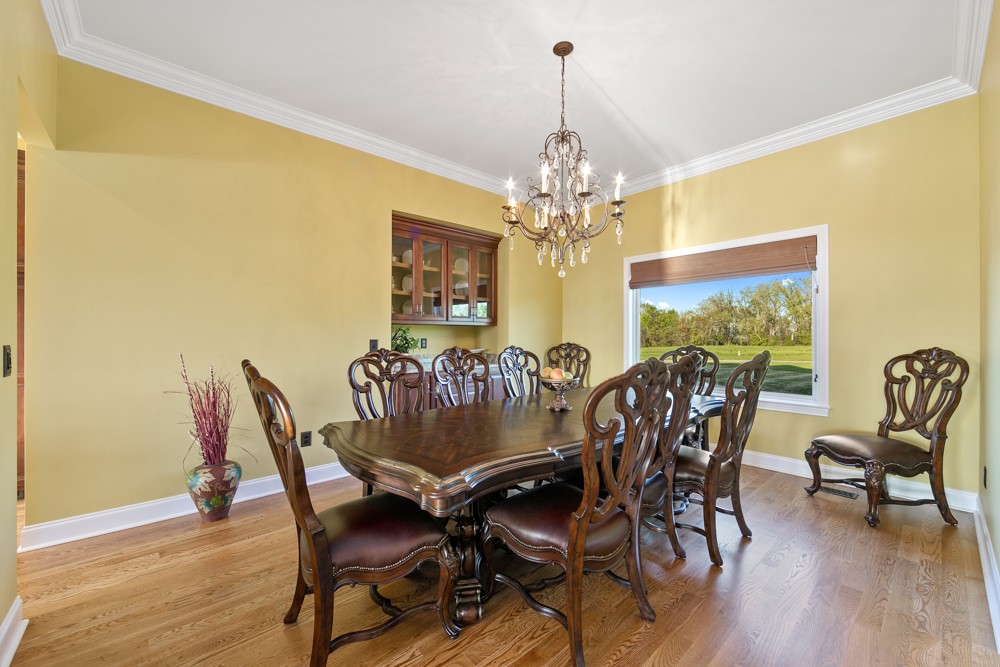 1895 French Brantley Road Wartrace, TN 37183 - Photo 20 of 50 a view of a dining room with furniture a chandelier and wooden floor