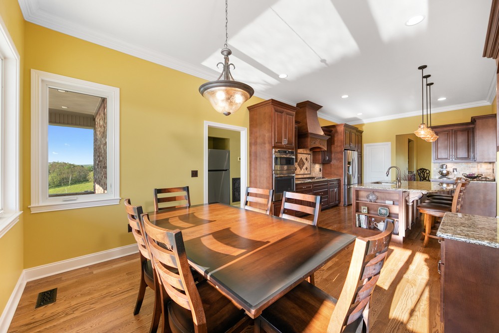 1895 French Brantley Road Wartrace, TN 37183 - Photo 28 of 50 a view of a dining room with furniture a chandelier and wooden floor