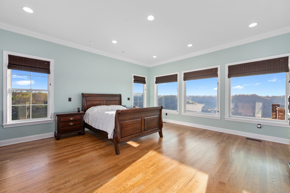 1895 French Brantley Road Wartrace, TN 37183 - Photo 33 of 50 a spacious bedroom with a large bed and a large window