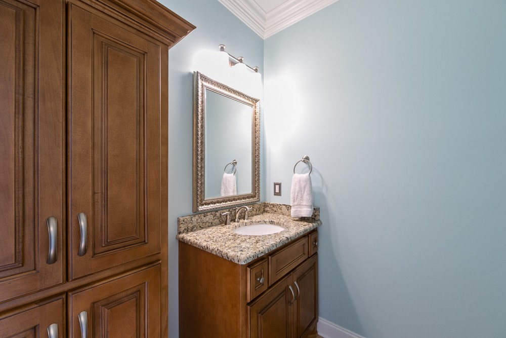 1895 French Brantley Road Wartrace, TN 37183 - Photo 40 of 50 a bathroom with a granite countertop sink and a mirror