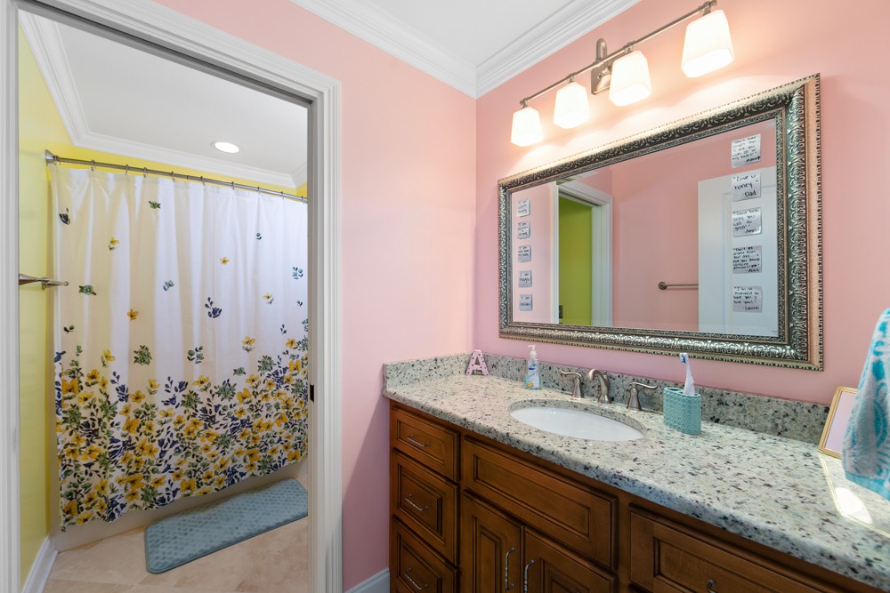1895 French Brantley Road Wartrace, TN 37183 - Photo 45 of 50 a bathroom with a granite countertop sink and a mirror