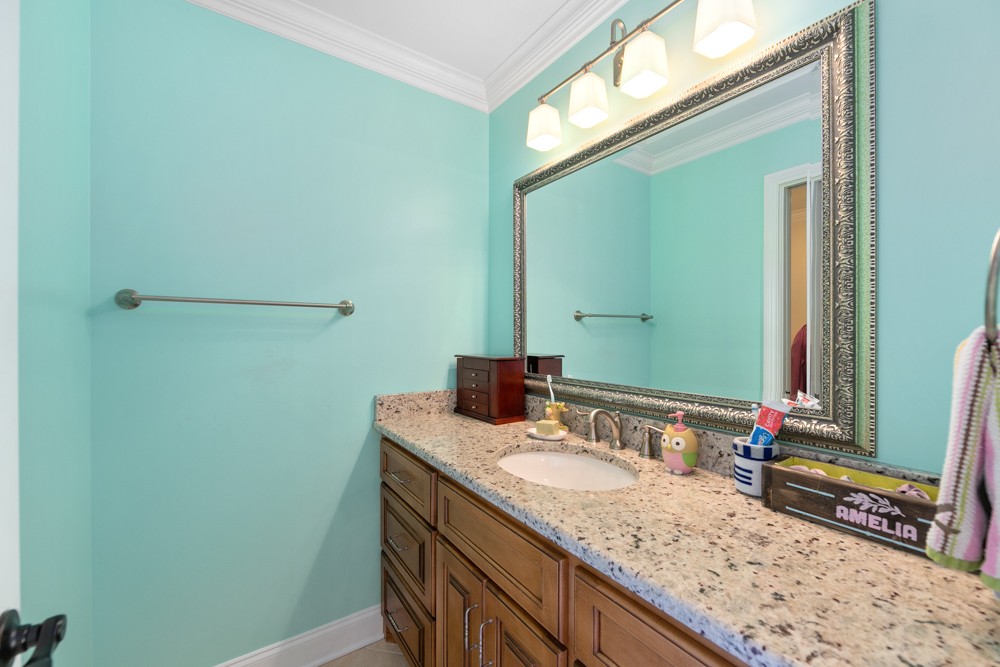 1895 French Brantley Road Wartrace, TN 37183 - Photo 47 of 50 a bathroom with a granite countertop sink and a mirror
