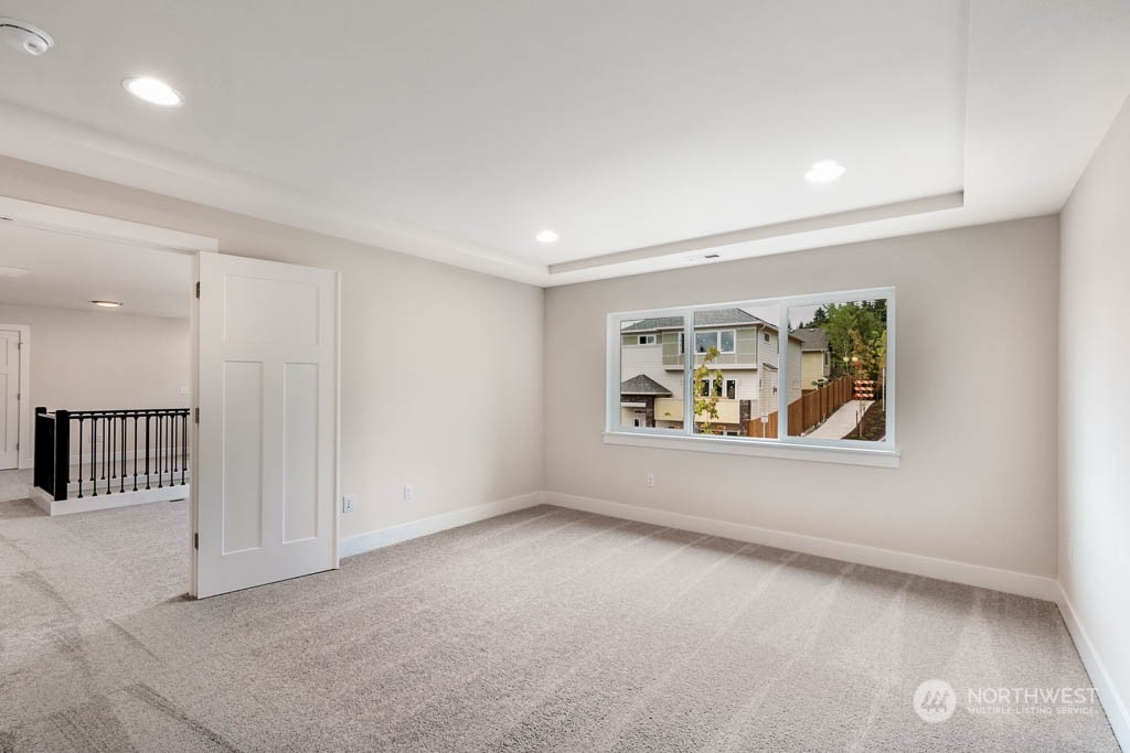 22921 20th Place West Bothell, WA 98021 - Photo 15 of 27 an empty room with windows and closet