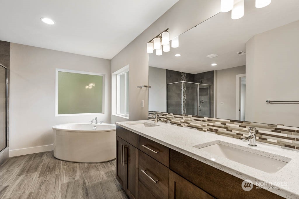 22921 20th Place West Bothell, WA 98021 - Photo 16 of 27 a bathroom with a sink double vanity and a mirror