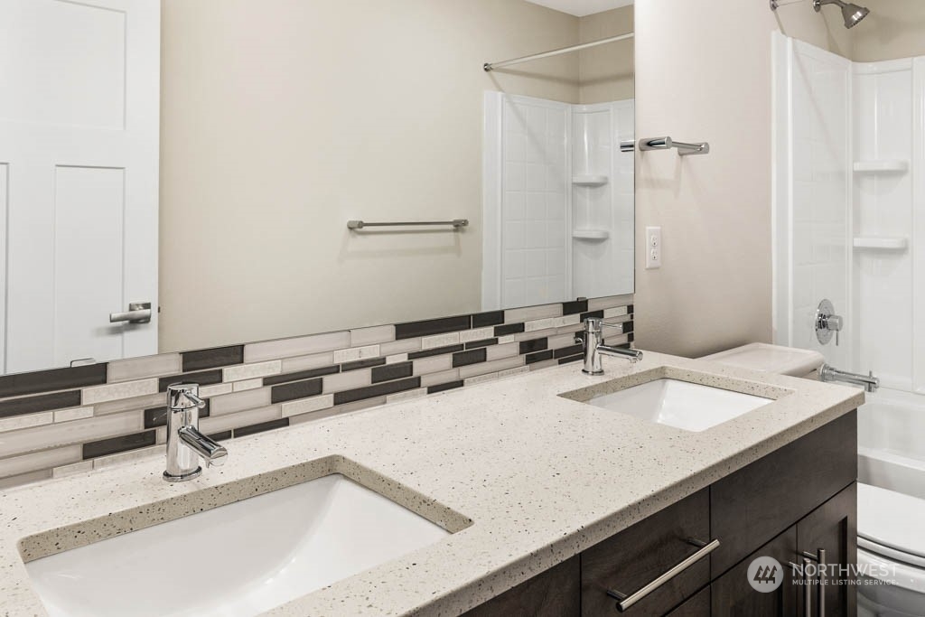 22921 20th Place West Bothell, WA 98021 - Photo 26 of 27 a bathroom with a sink and a mirror