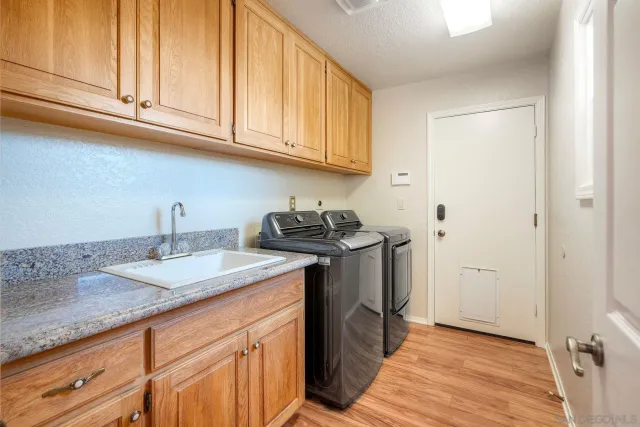 a view of a livingroom with a fireplace and window