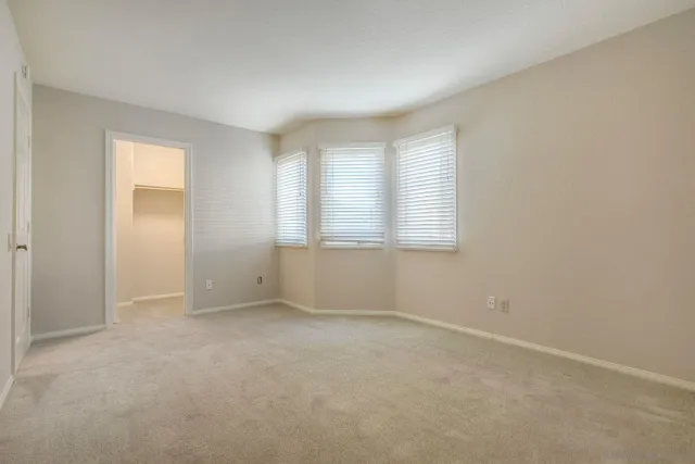 a view of swimming pool with a patio