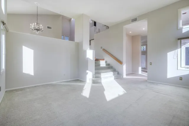 a view of entryway and hall with a window