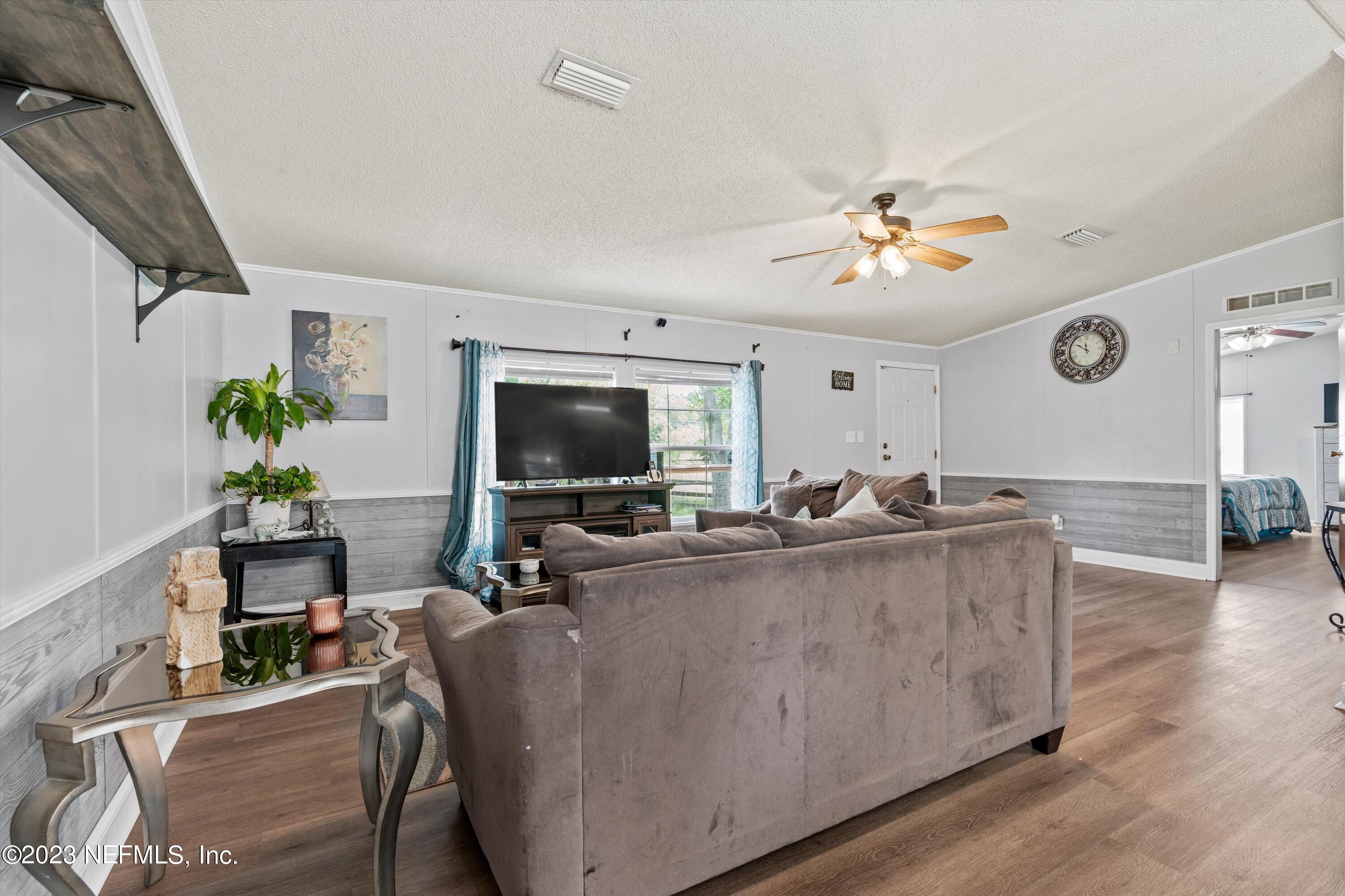 7940 Plummer Road Jacksonville, FL 32219 - Photo 7 of 27 07-Living Room