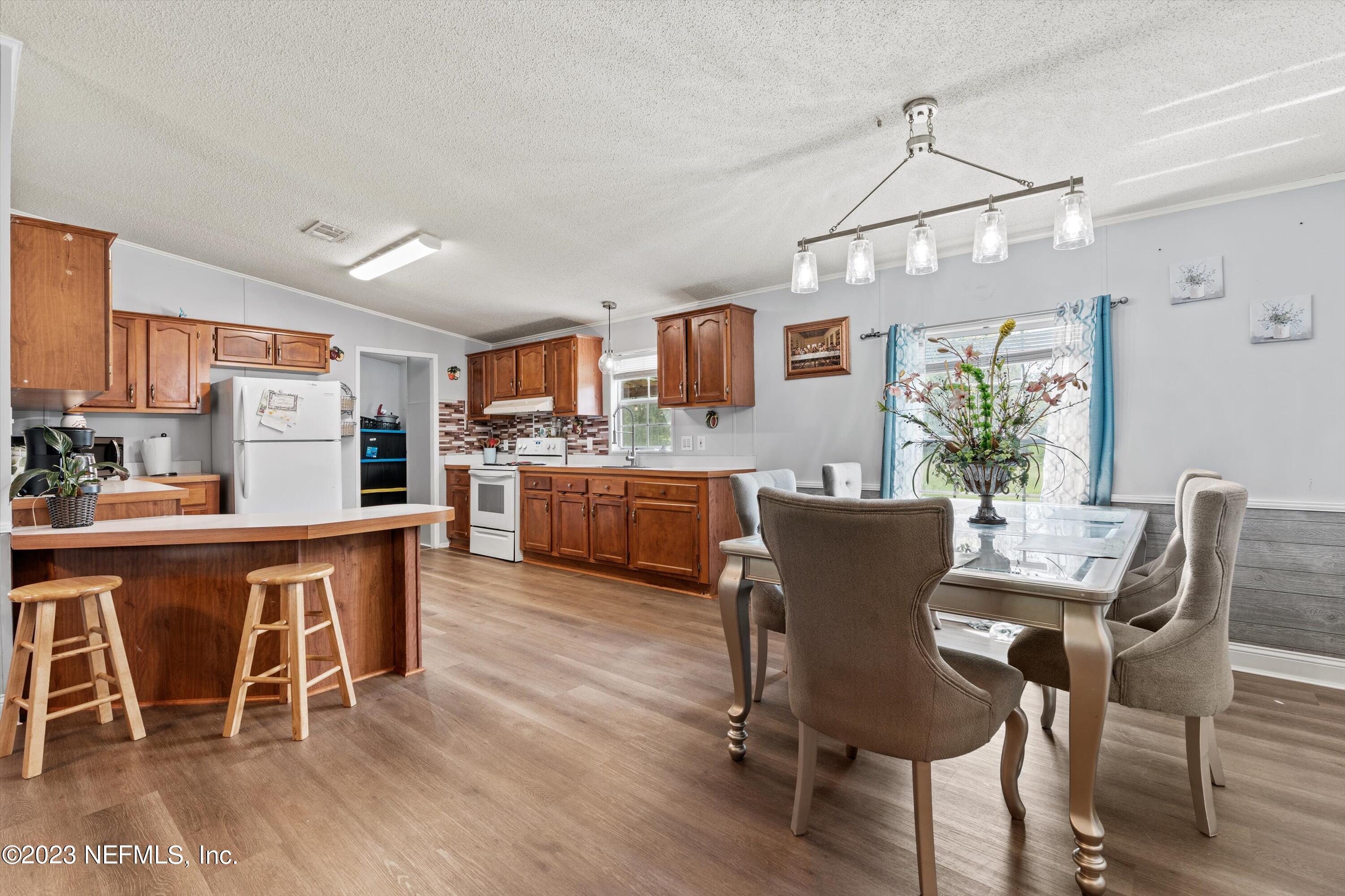 7940 Plummer Road Jacksonville, FL 32219 - Photo 10 of 27 10-Dining to Kitchen