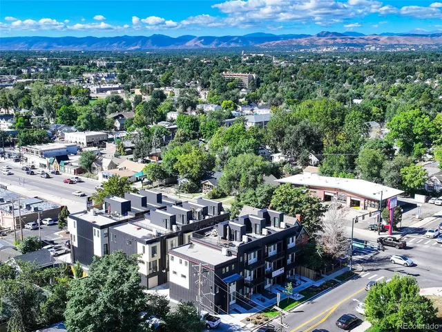 a view of a city with lots of trees
