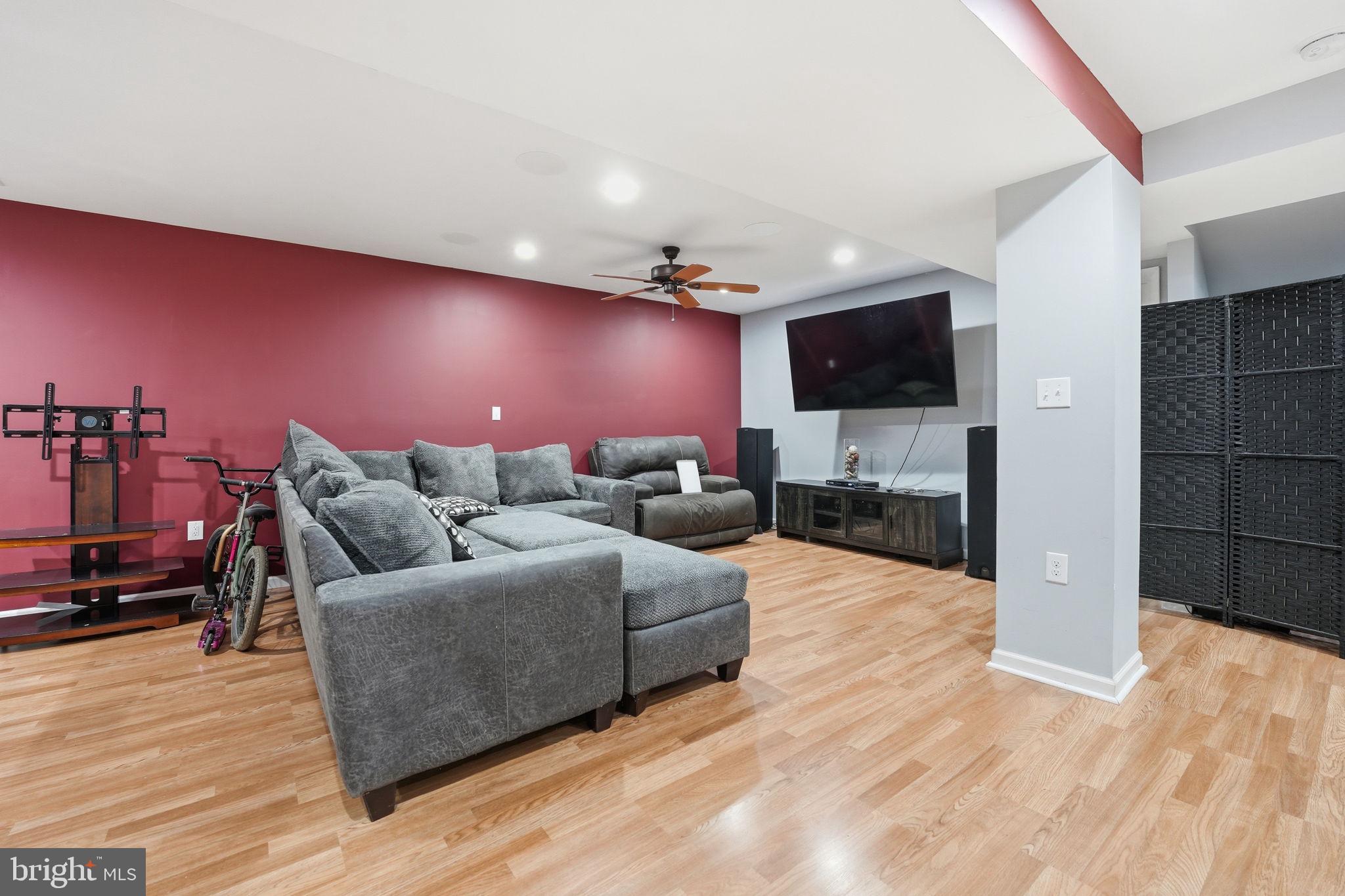 9334 Inaugural Drive King George, VA 22485 - Photo 17 of 26 a living room with furniture and a flat screen tv