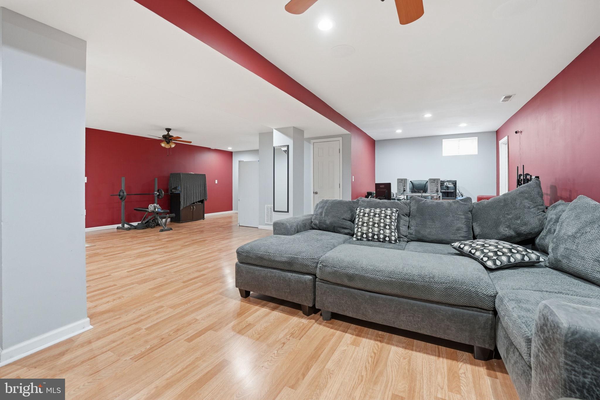 9334 Inaugural Drive King George, VA 22485 - Photo 19 of 26 a living room with furniture and a couch