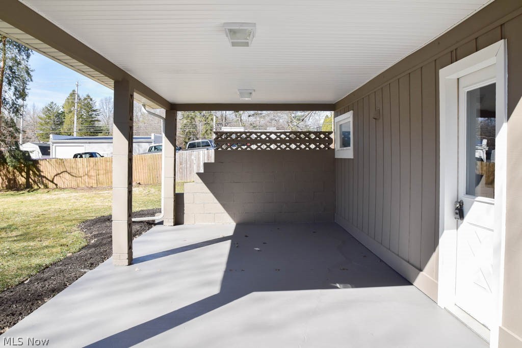 3410 Pontius Road Uniontown, OH 44685 - Photo 21 of 25 Covered patio with a new roof.