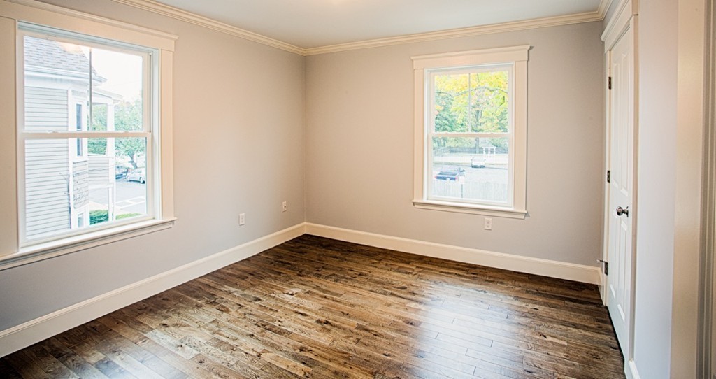 29 Lafayette Road Ipswich, MA 01938 - Photo 11 of 20 a view of an empty room with wooden floor and a window