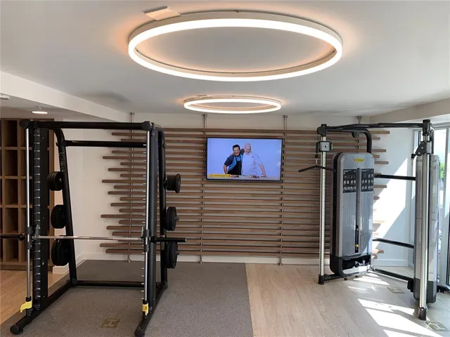 a view of a room with wooden walls