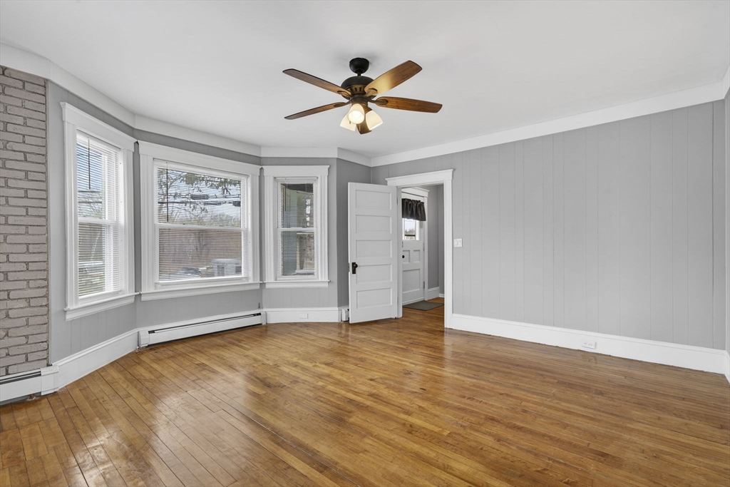 22 Maple Street Templeton, MA 01436 - Photo 13 of 28 a view of an empty room with window and wooden floor