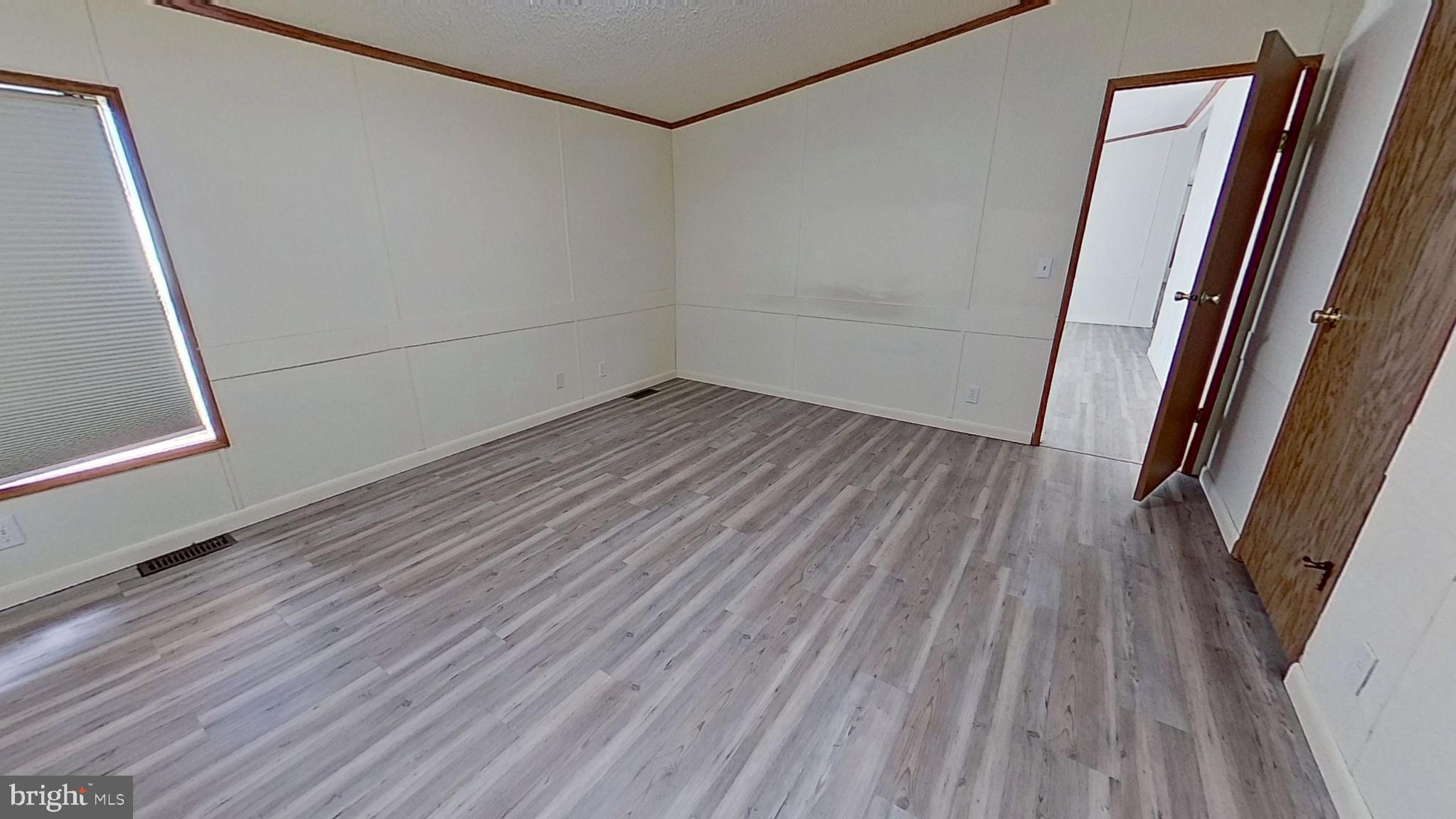 4975 Spring Road Hellam, PA 17406 - Photo 12 of 13 a view of a room with wooden floor