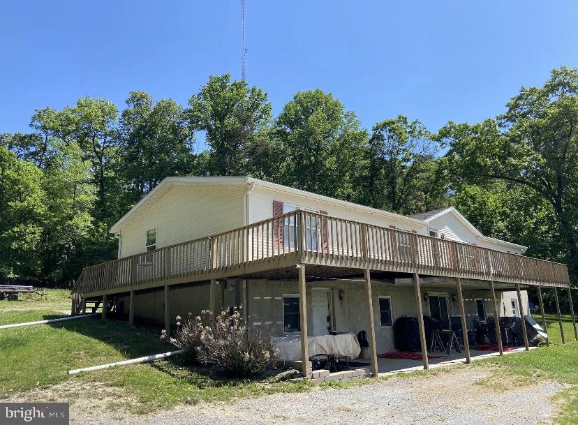 4975 Spring Road Hellam, PA 17406 - Photo 2 of 13 a front view of a house with garden