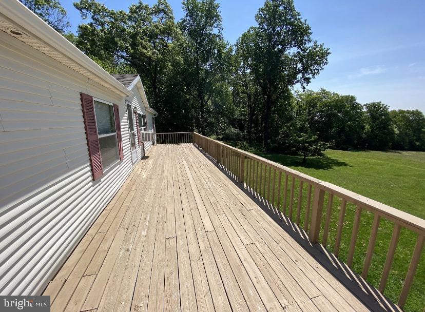 4975 Spring Road Hellam, PA 17406 - Photo 3 of 13 a view of balcony with wooden floor and fence