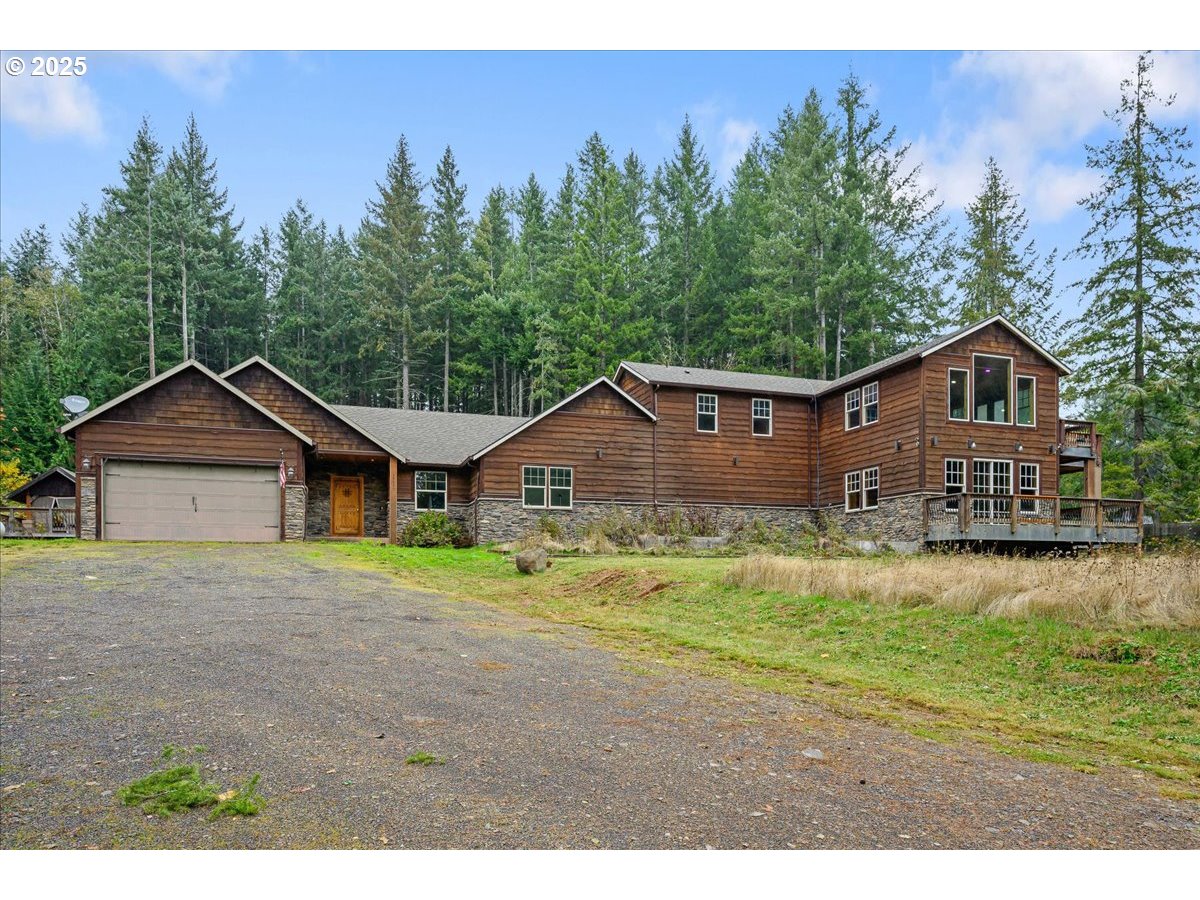 39577 Southeast Kitzmiller Road Eagle Creek, OR 97022 - Photo 38 of 41 a house view with a outdoor space