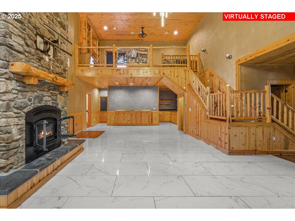 39577 Southeast Kitzmiller Road Eagle Creek, OR 97022 - Photo 10 of 41 a view of a livingroom with furniture and a fireplace