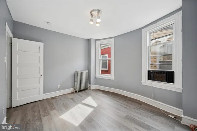 an empty room with windows