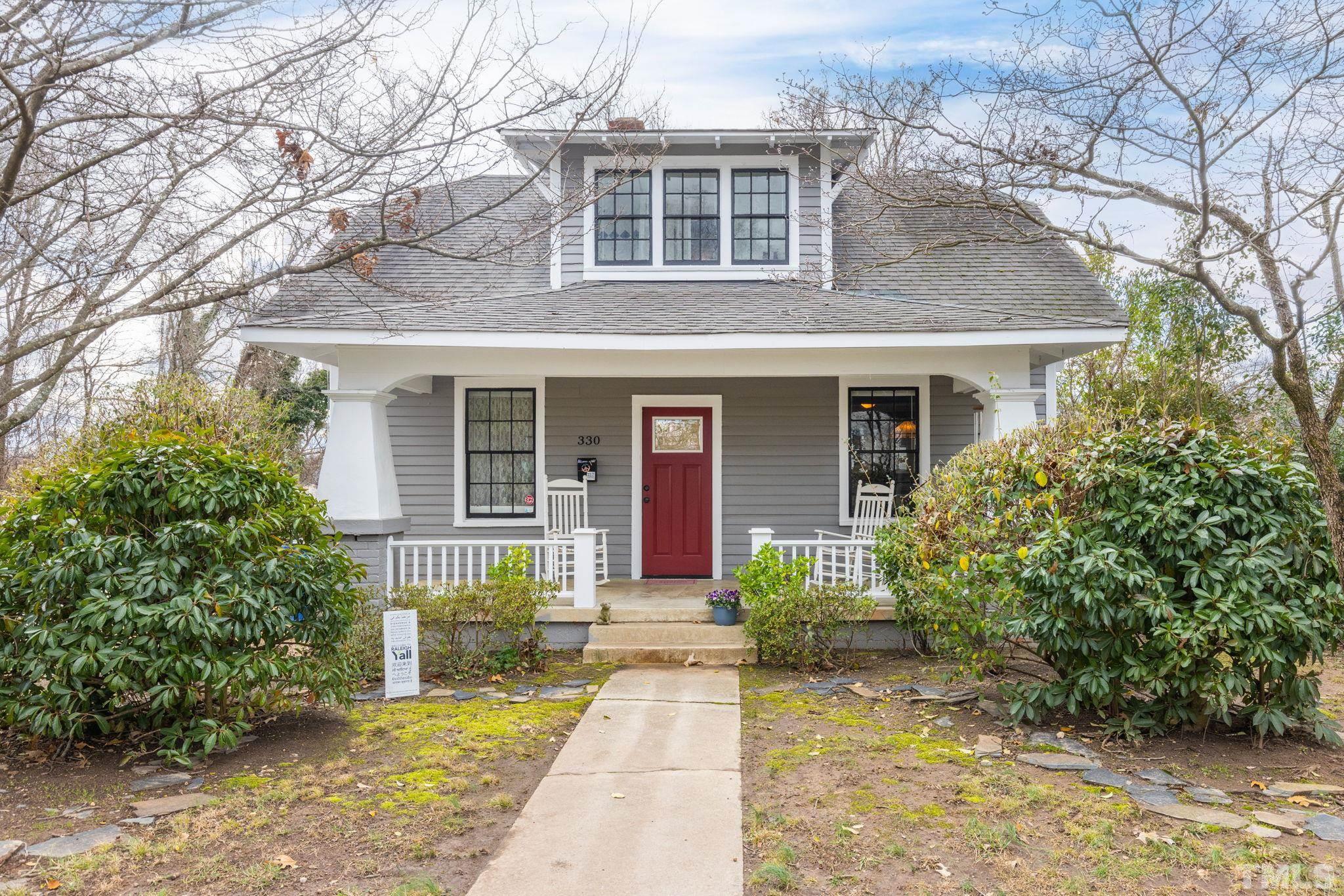 front view of a house with a yard