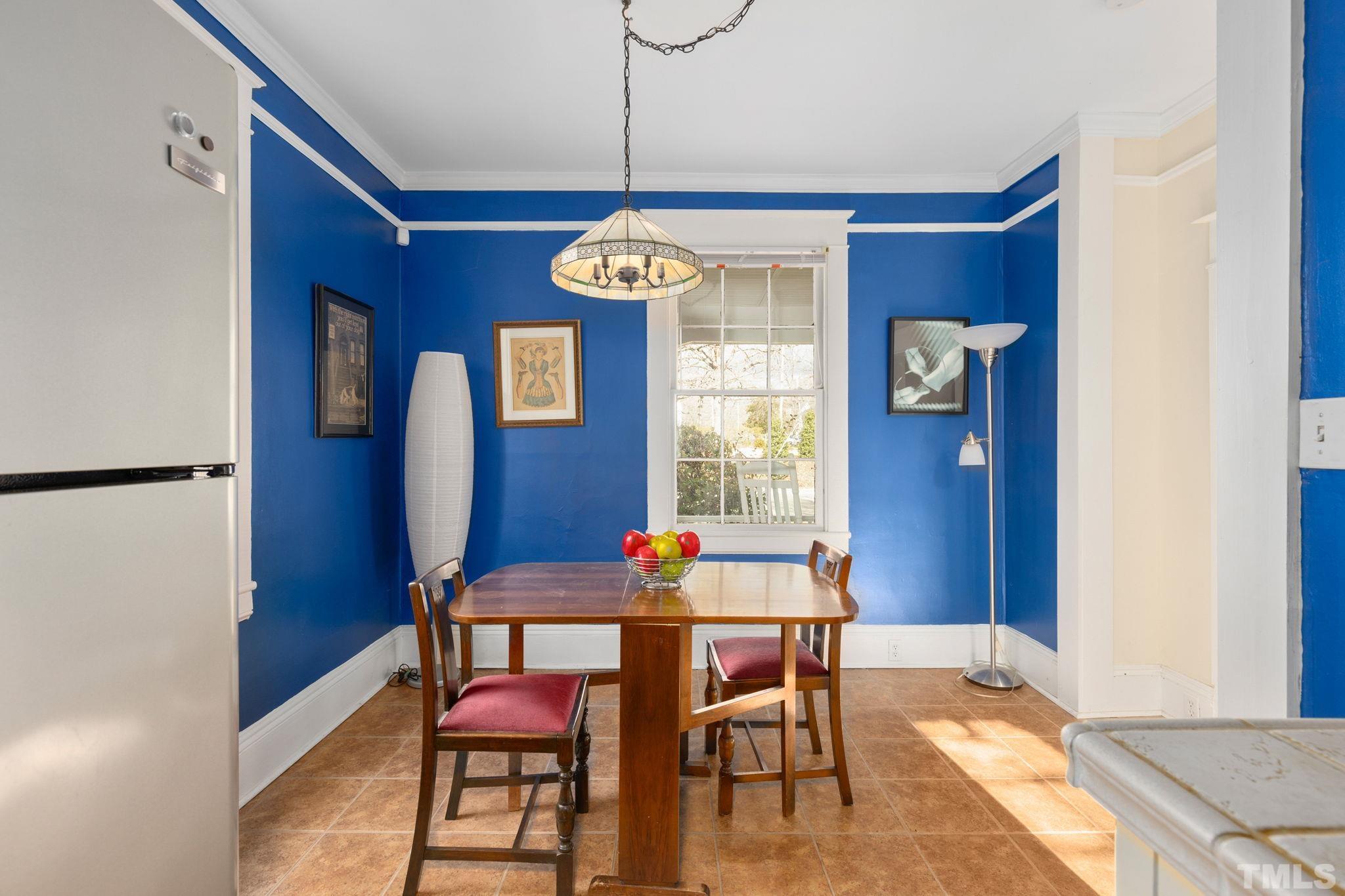 330 Pershing Road Raleigh, NC 27608 - Photo 14 of 51 a dining room with furniture and window