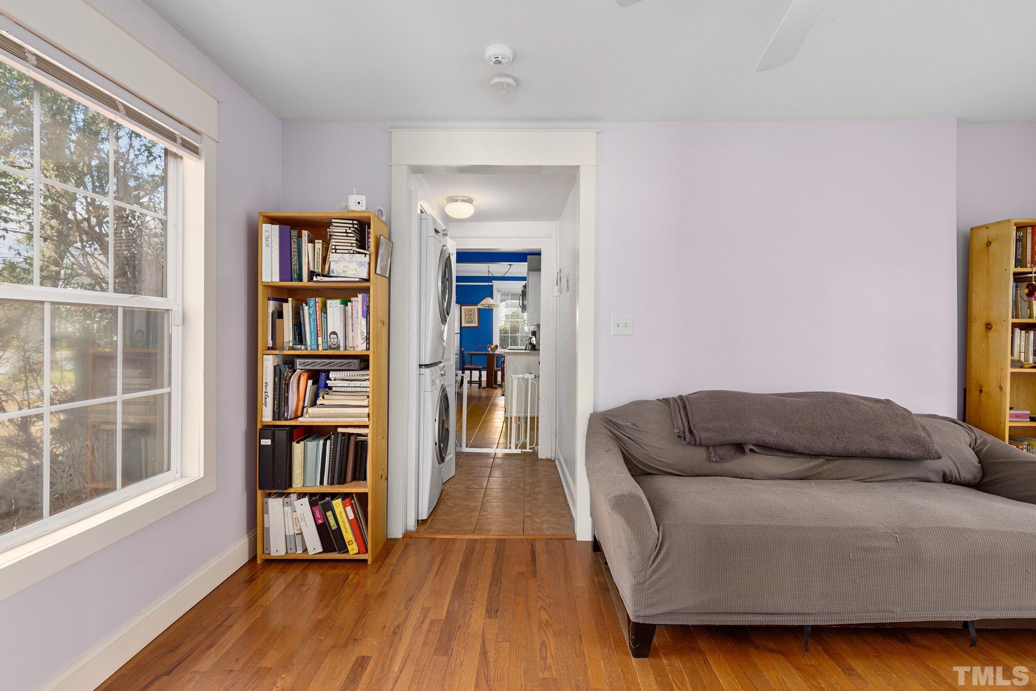 330 Pershing Road Raleigh, NC 27608 - Photo 18 of 51 a living room with furniture and a book shelf