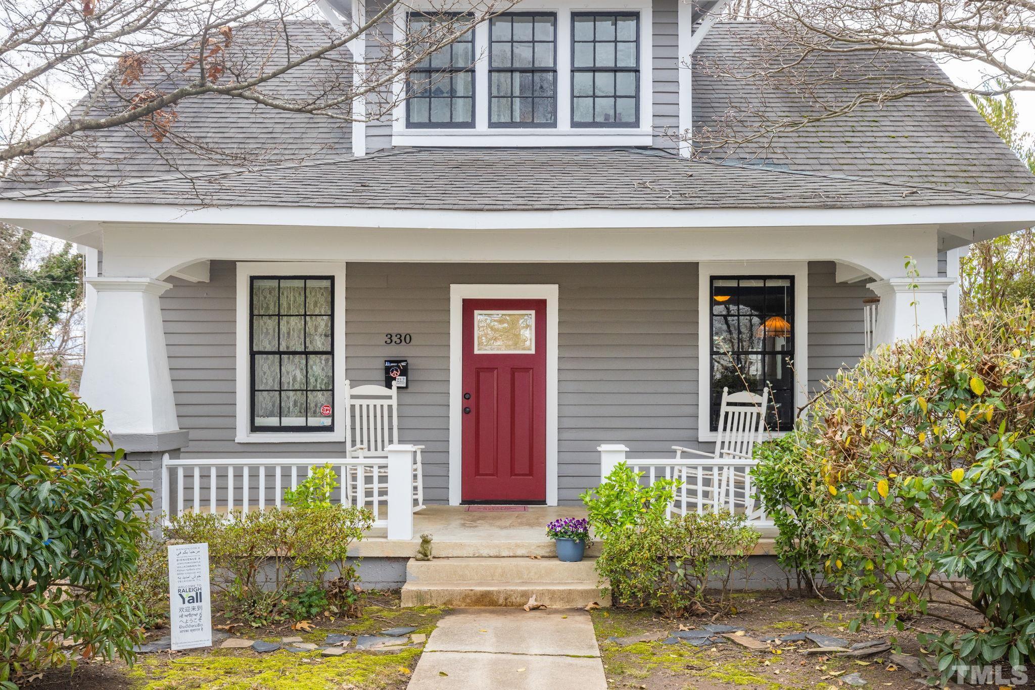 330 Pershing Road Raleigh, NC 27608 - Photo 2 of 51 Make sure you bring your rocking chairs for this large covered front porch.