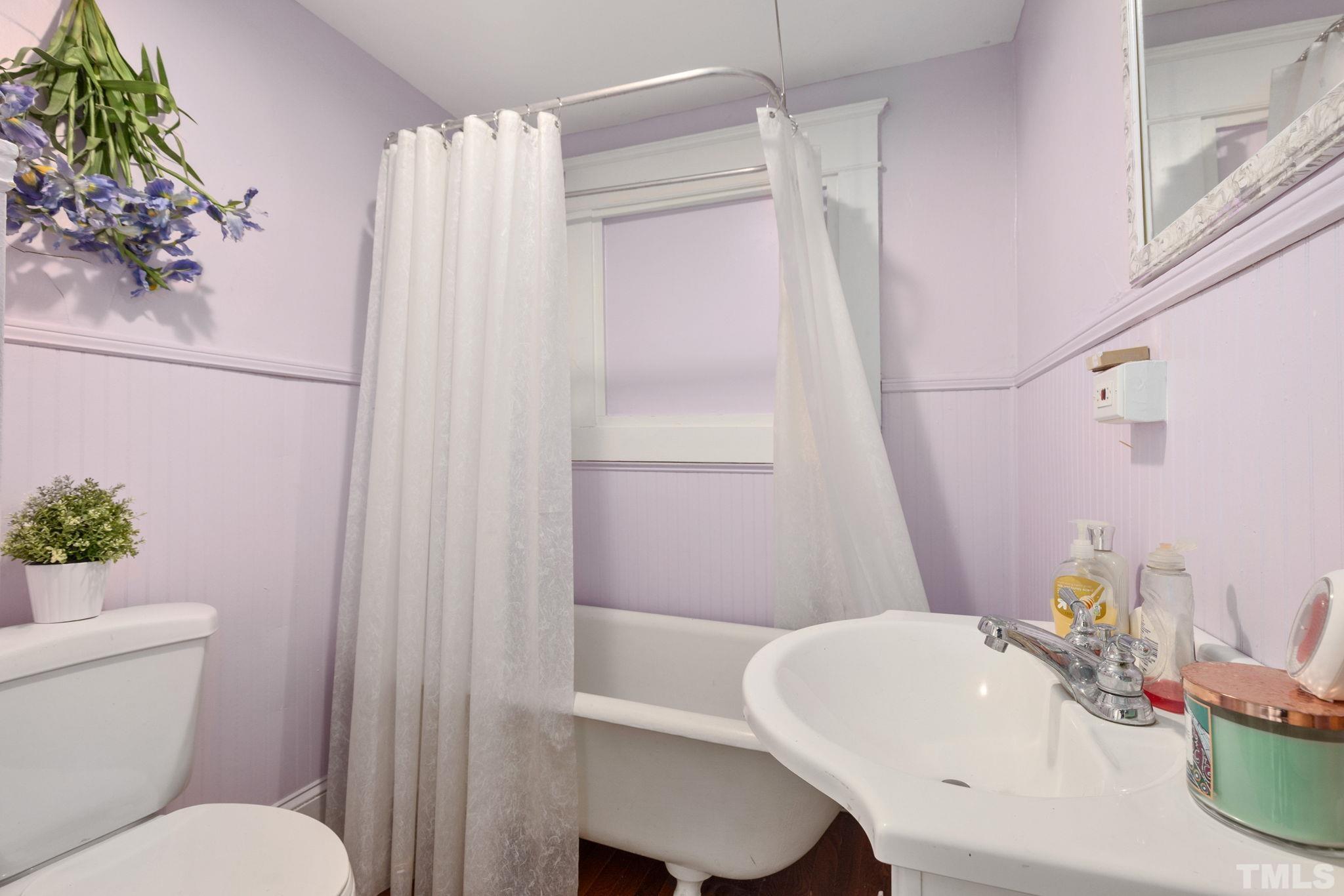 330 Pershing Road Raleigh, NC 27608 - Photo 22 of 51 a bathroom with a sink toilet and shower