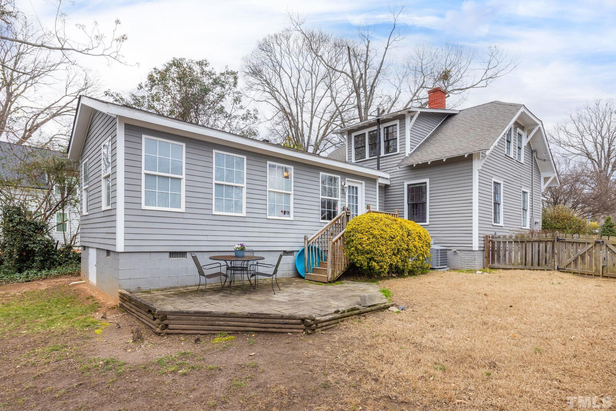 330 Pershing Road Raleigh, NC 27608 - Photo 35 of 51 The rear view of the property. The large patio is perfect for outdoor entertaining.