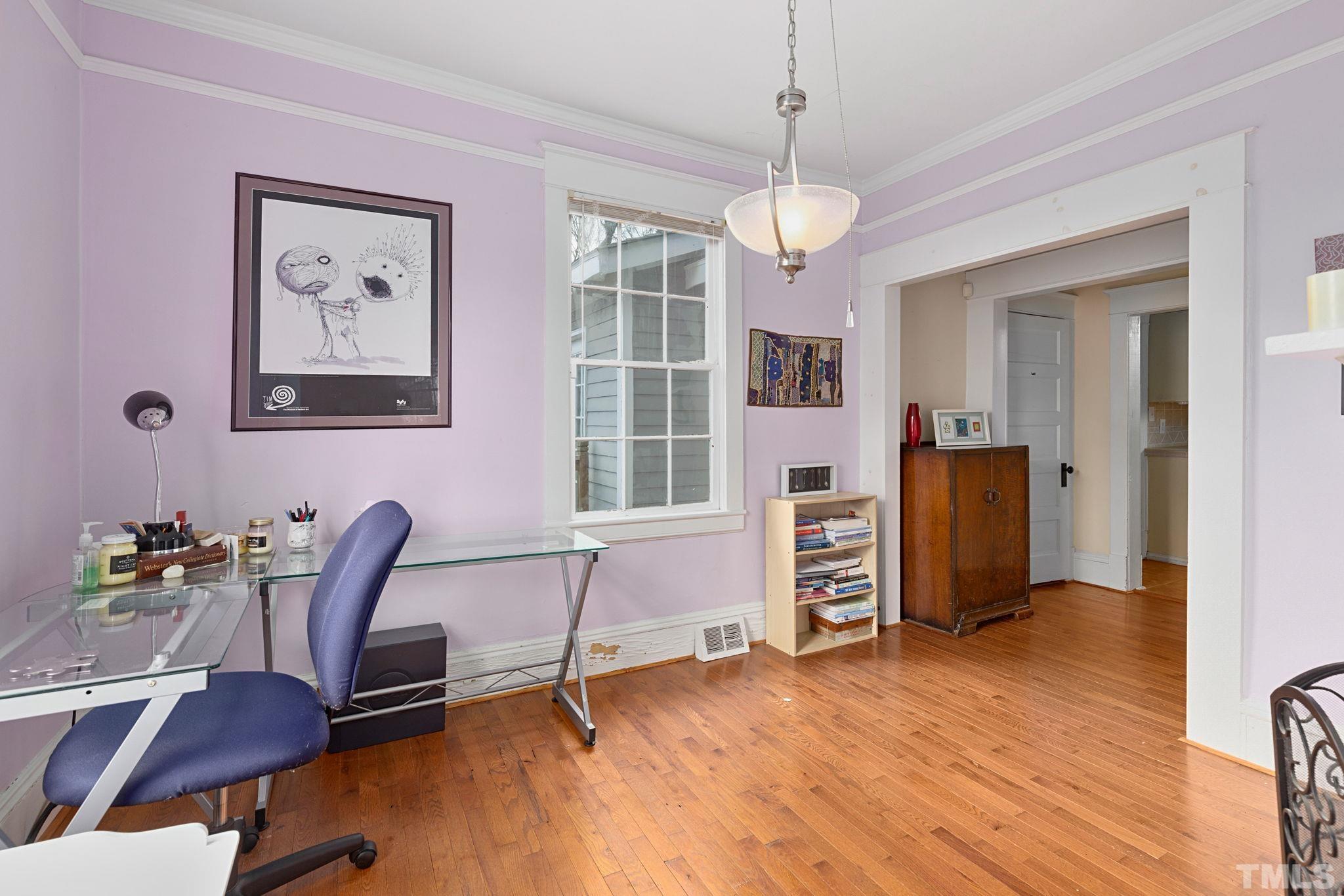 330 Pershing Road Raleigh, NC 27608 - Photo 8 of 51 a view of a workspace with furniture and a window