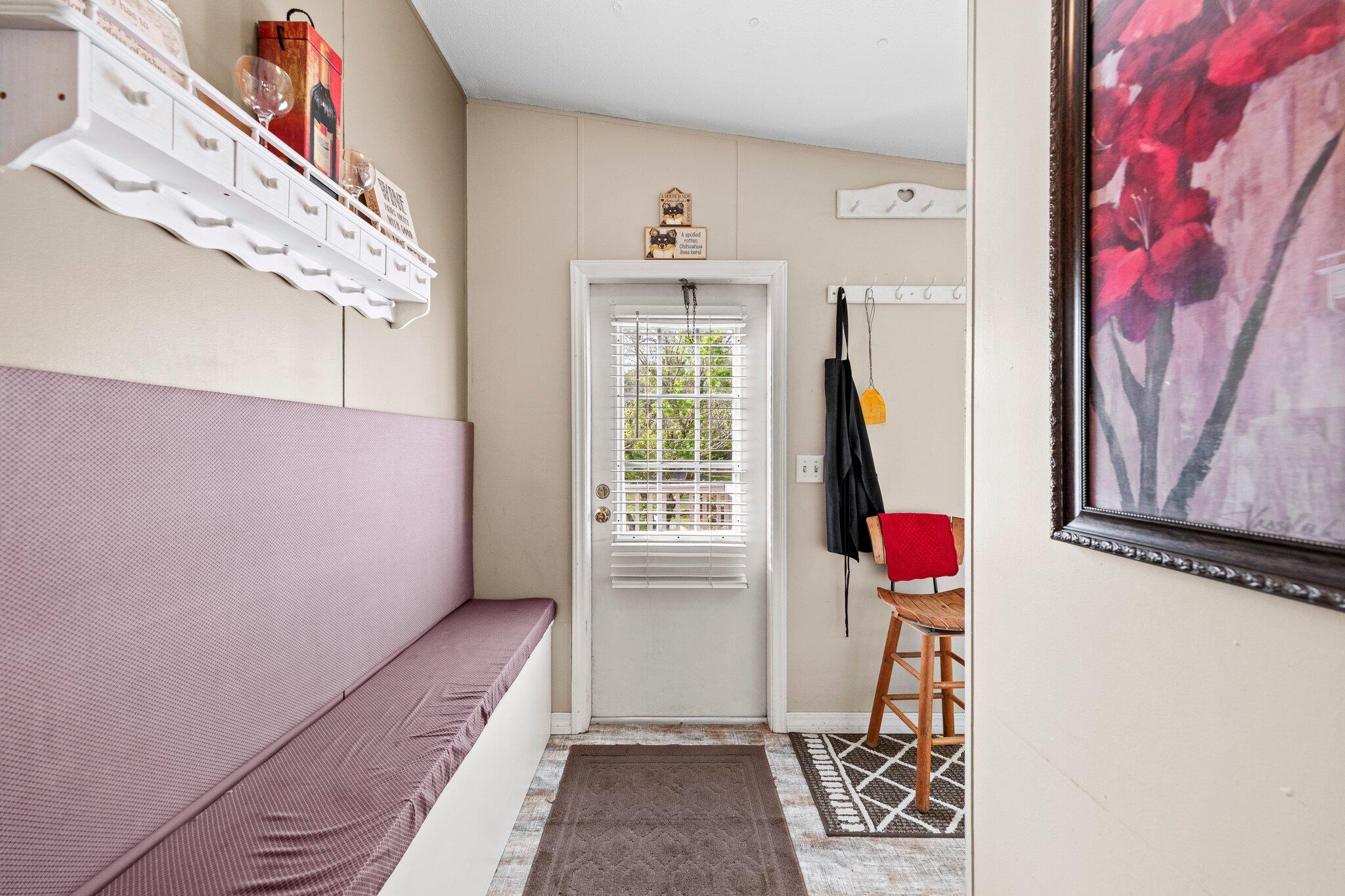 3062 Highland Avenue Crestview, FL 32539 - Photo 14 of 58 a view of a room with a potted plant and wooden floor
