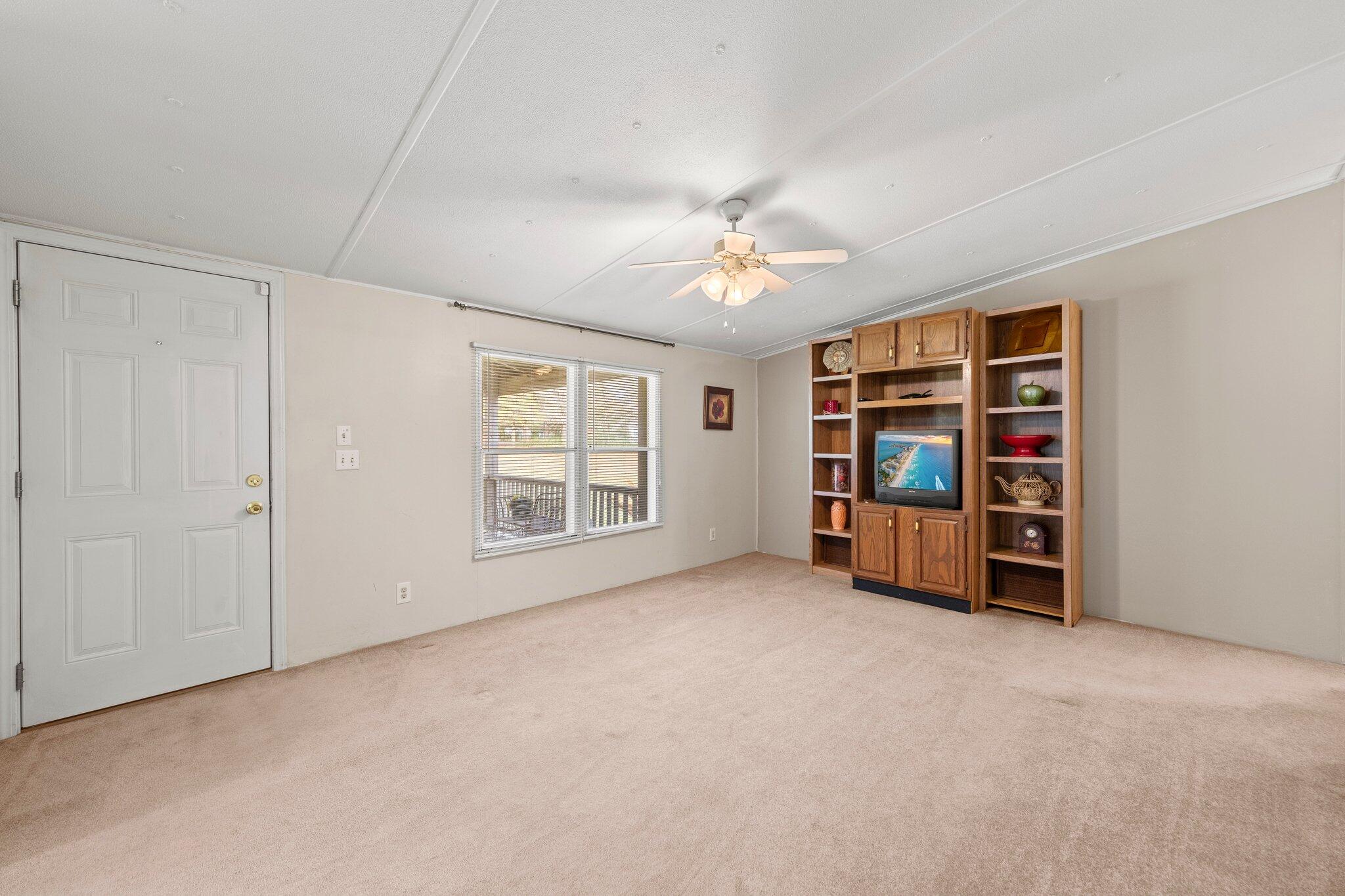 3062 Highland Avenue Crestview, FL 32539 - Photo 15 of 58 a view of an empty room with window and closet
