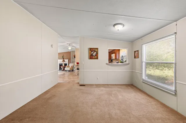 a room with furniture and a window