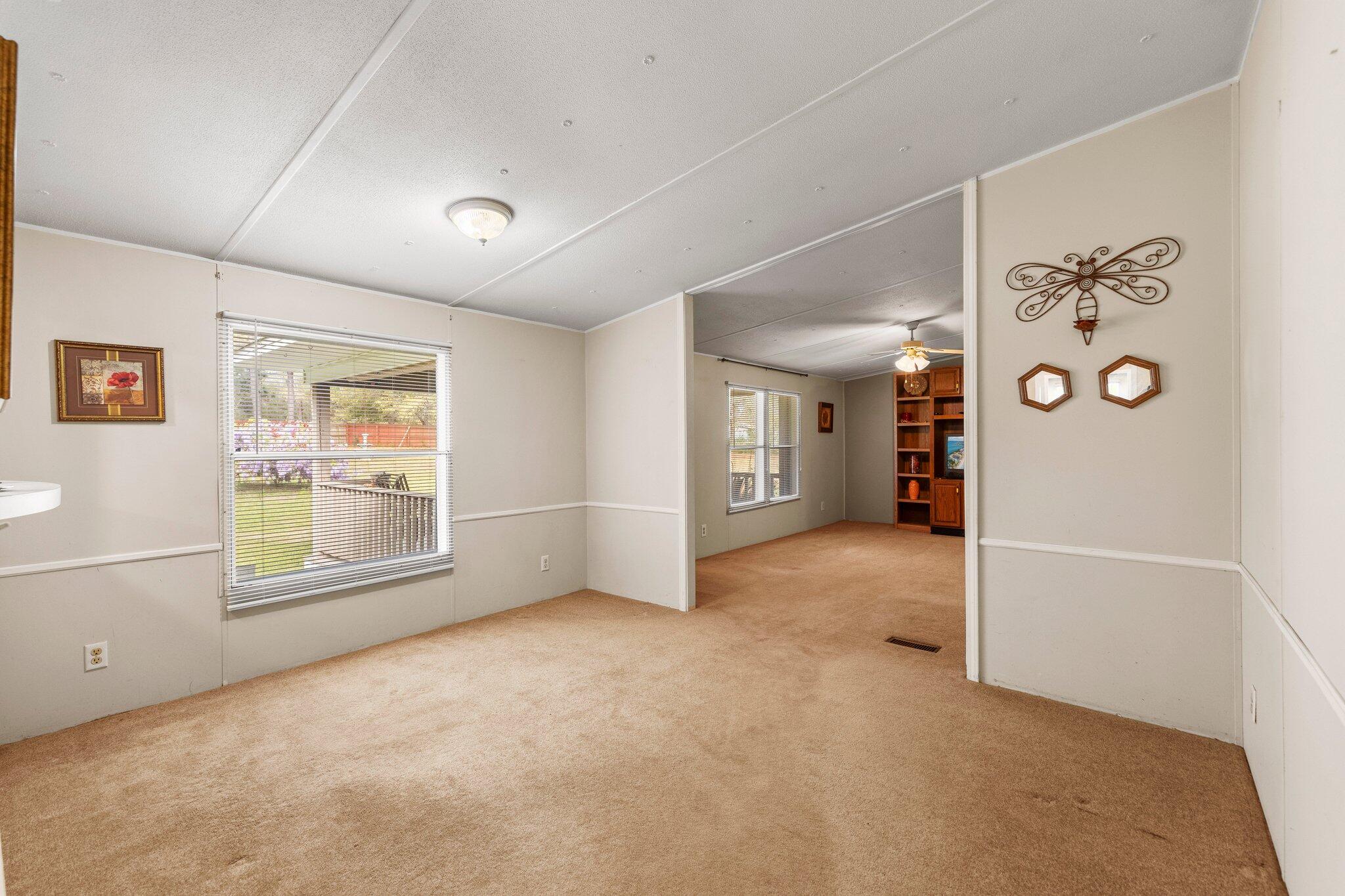 3062 Highland Avenue Crestview, FL 32539 - Photo 18 of 58 an empty room with windows and closet