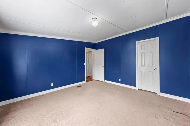 a view of a chairs on the roof deck