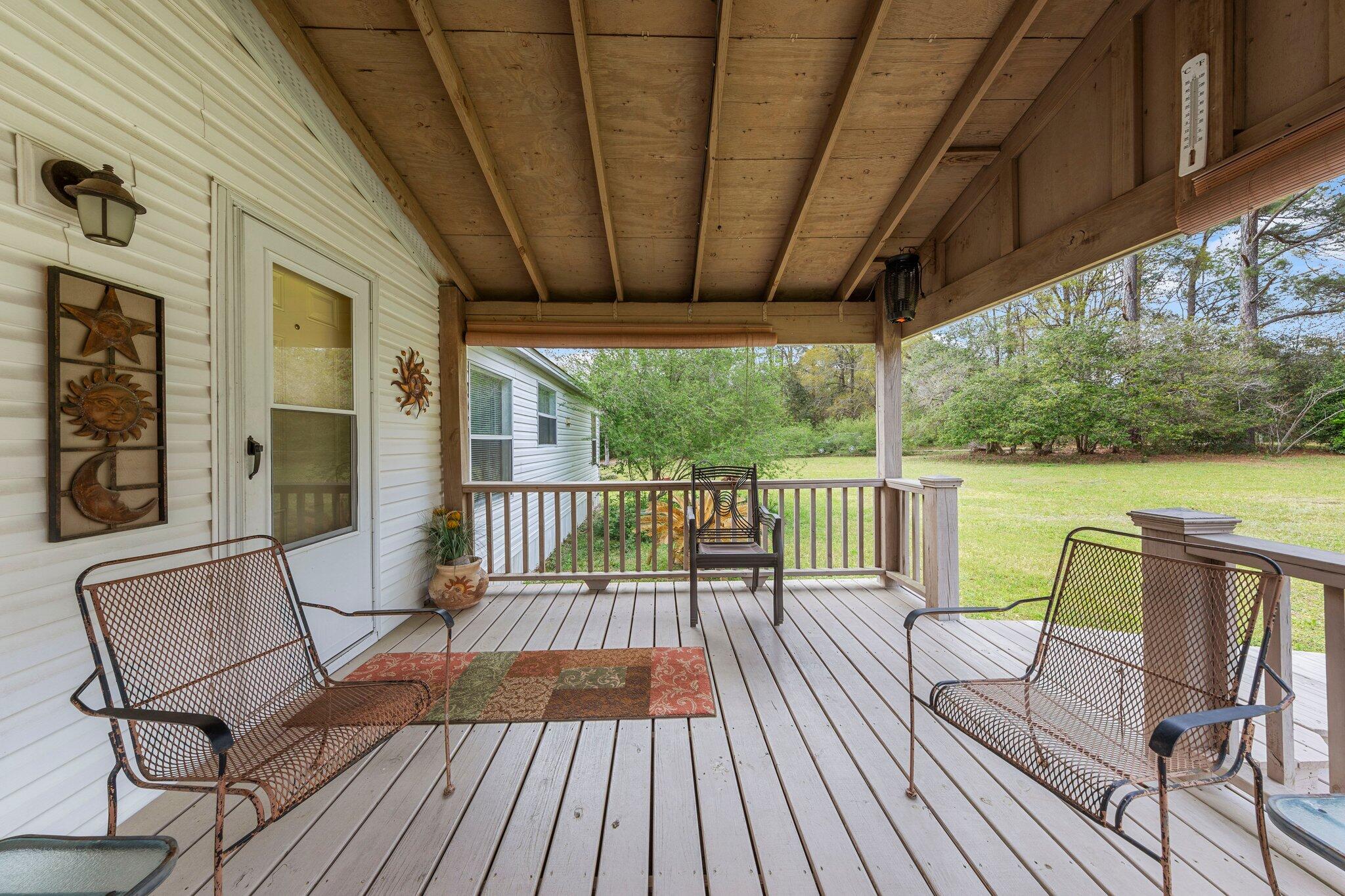 3062 Highland Avenue Crestview, FL 32539 - Photo 43 of 58 a view of a chairs on the roof deck