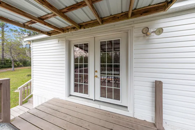 a view of a swimming pool with a patio