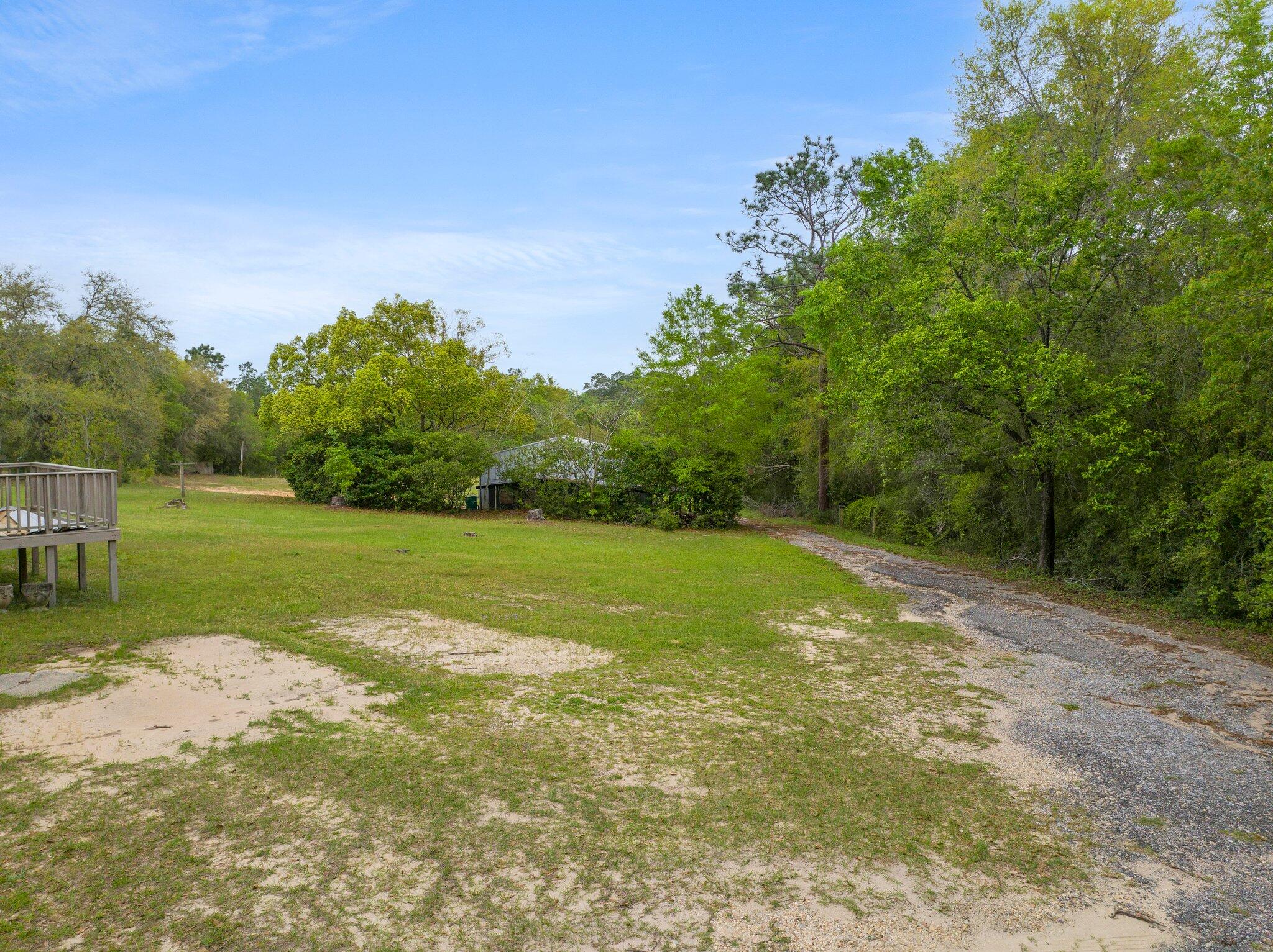 3062 Highland Avenue Crestview, FL 32539 - Photo 50 of 58 a view of a golf course with a park